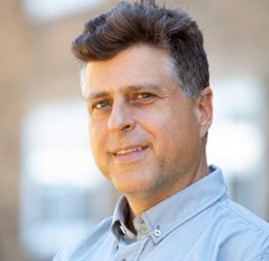 Dr. J. Adam Perry