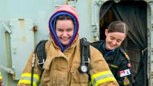 Student wearing fire gear